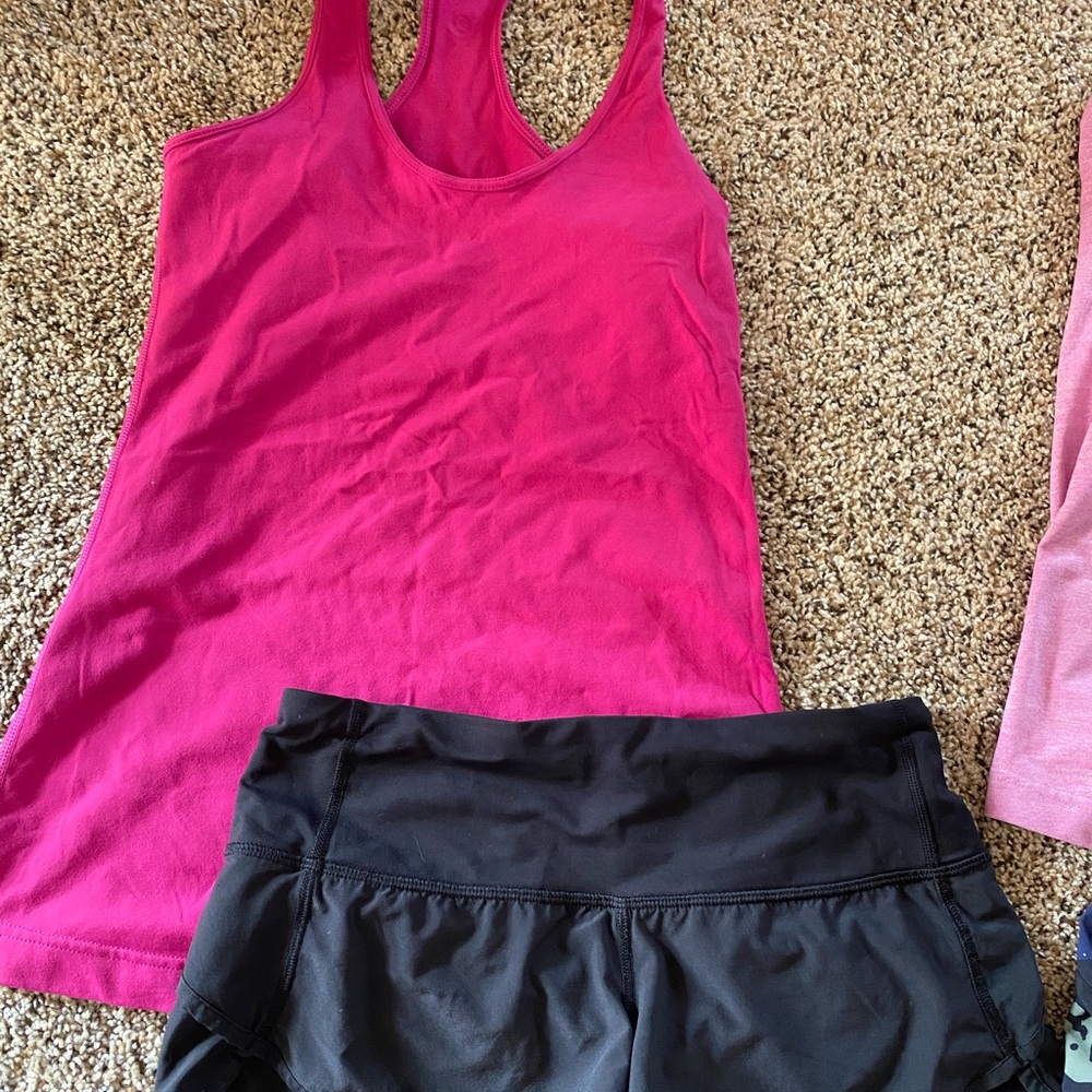 Lululemon set. Pink top, Sz S black shorts Sz S